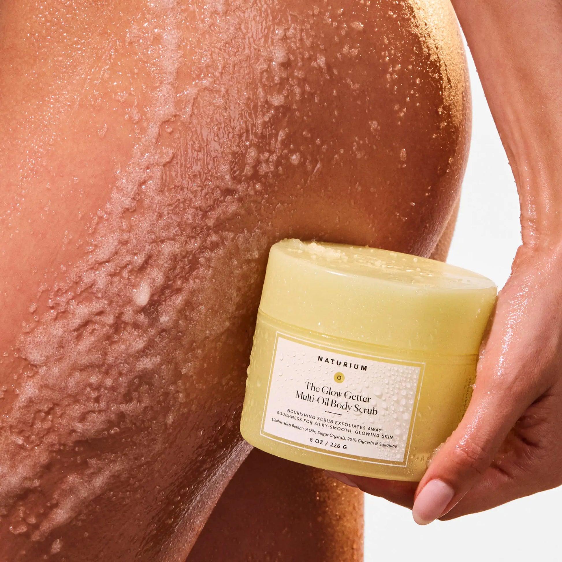 the-glow-getter-multi-oil-body-scrub-q7 NATR-40028-Alt-Image-The_Glow_Getter_Multi-Oil_Body_Scrub-07.webp