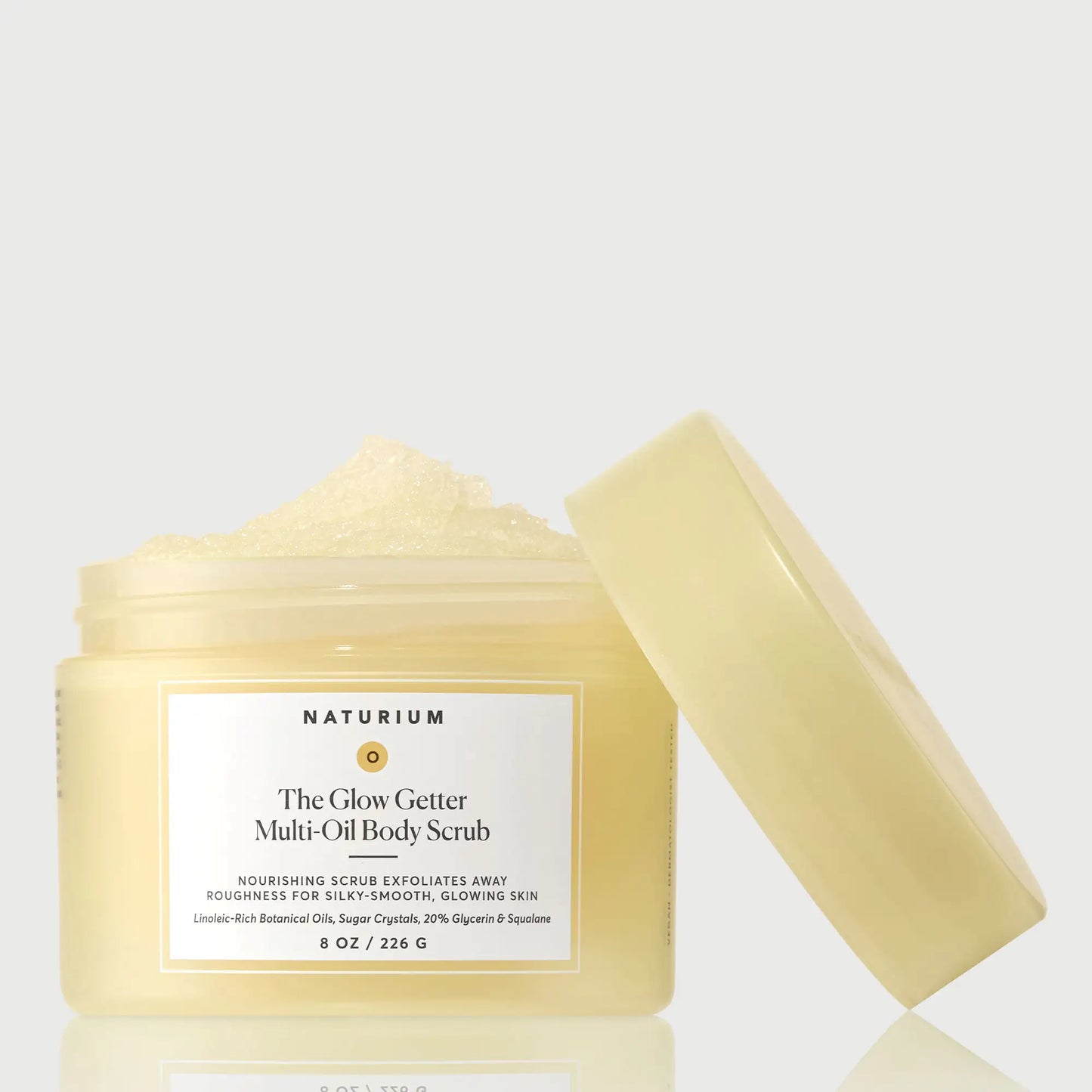 the-glow-getter-multi-oil-body-scrub-q7 NATR-40028-GlowGetter-Multi-Oil-Body-Scrub-Front-CapOff-bonebkgd.webp