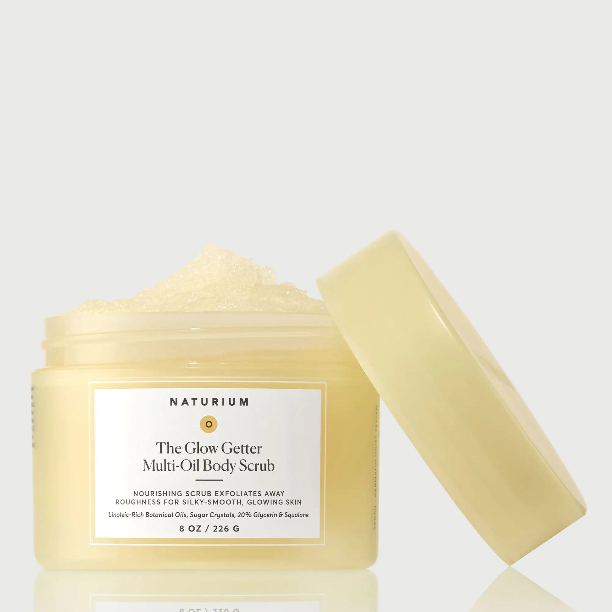 the-glow-getter-multi-oil-body-scrub-q7 NATR-40028-GlowGetter-Multi-Oil-Body-Scrub-Front-CapOff-bonebkgd.webp