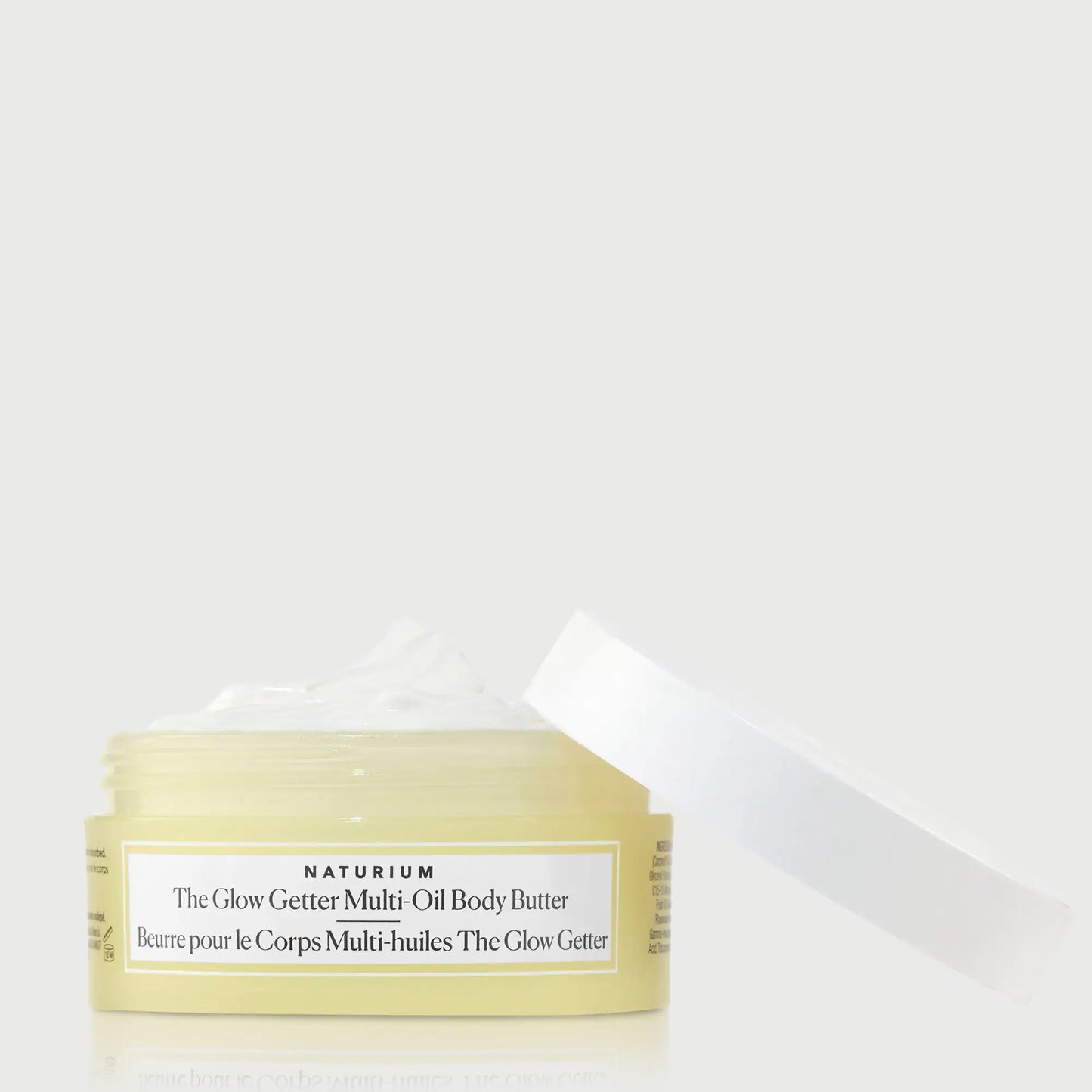 the-glow-getter-multi-oil-body-butter-travel-size-g4 NATR-40115_Glow-Getter-Body-Butter-Mini_front_capoff_bonebkgd.webp