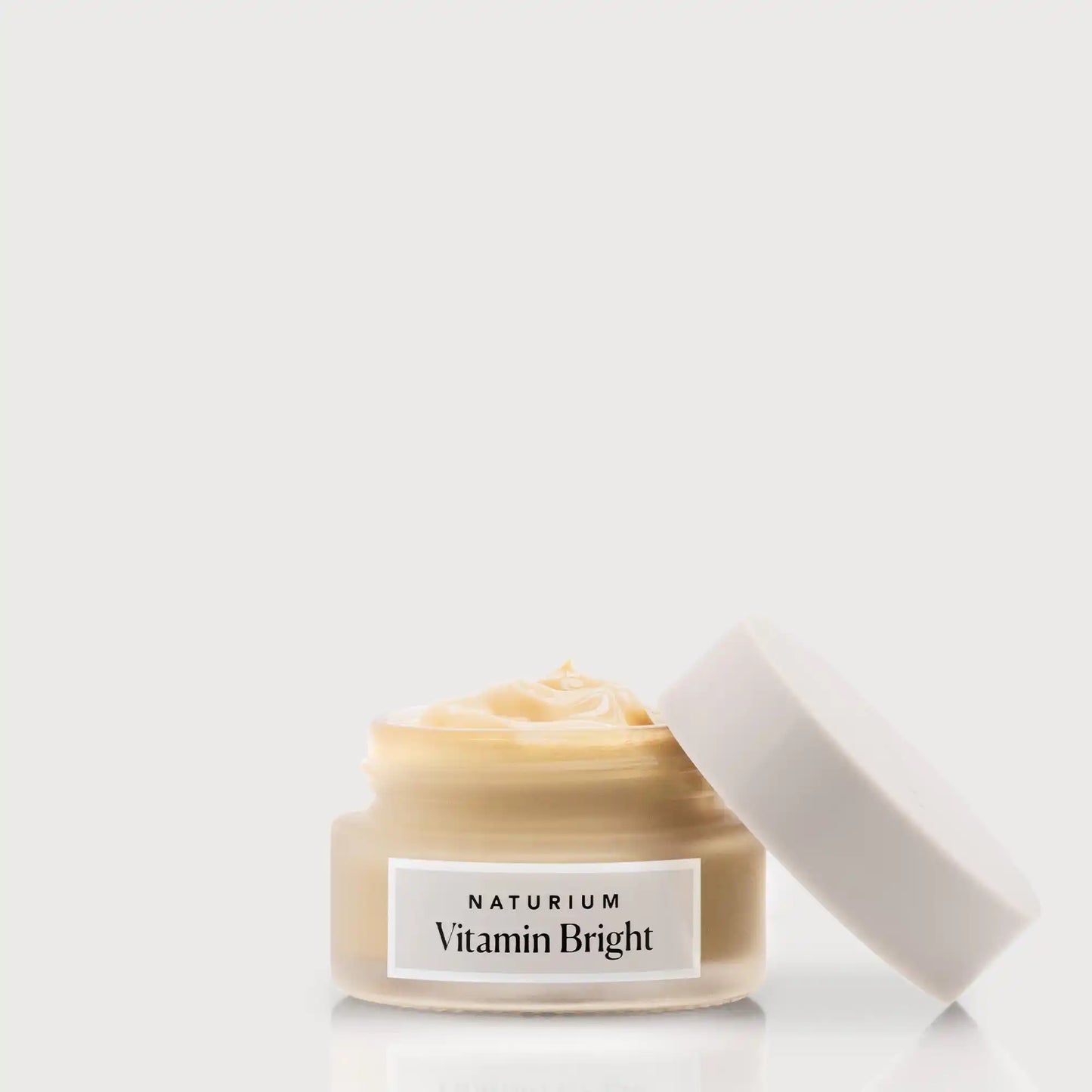 vitamin-bright-illuminating-eye-cream-t1 NATR-VitaminBright_LIGHT_Primary_front_openjar_bone.webp
